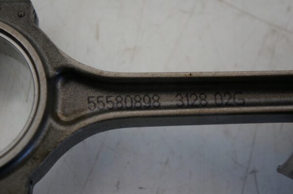 15202495319-696a757b8af2a TŁOK KORBOWÓD OPEL KARL CORSA E 1,0 B10XE 55580898 5560C 607852764 JB20