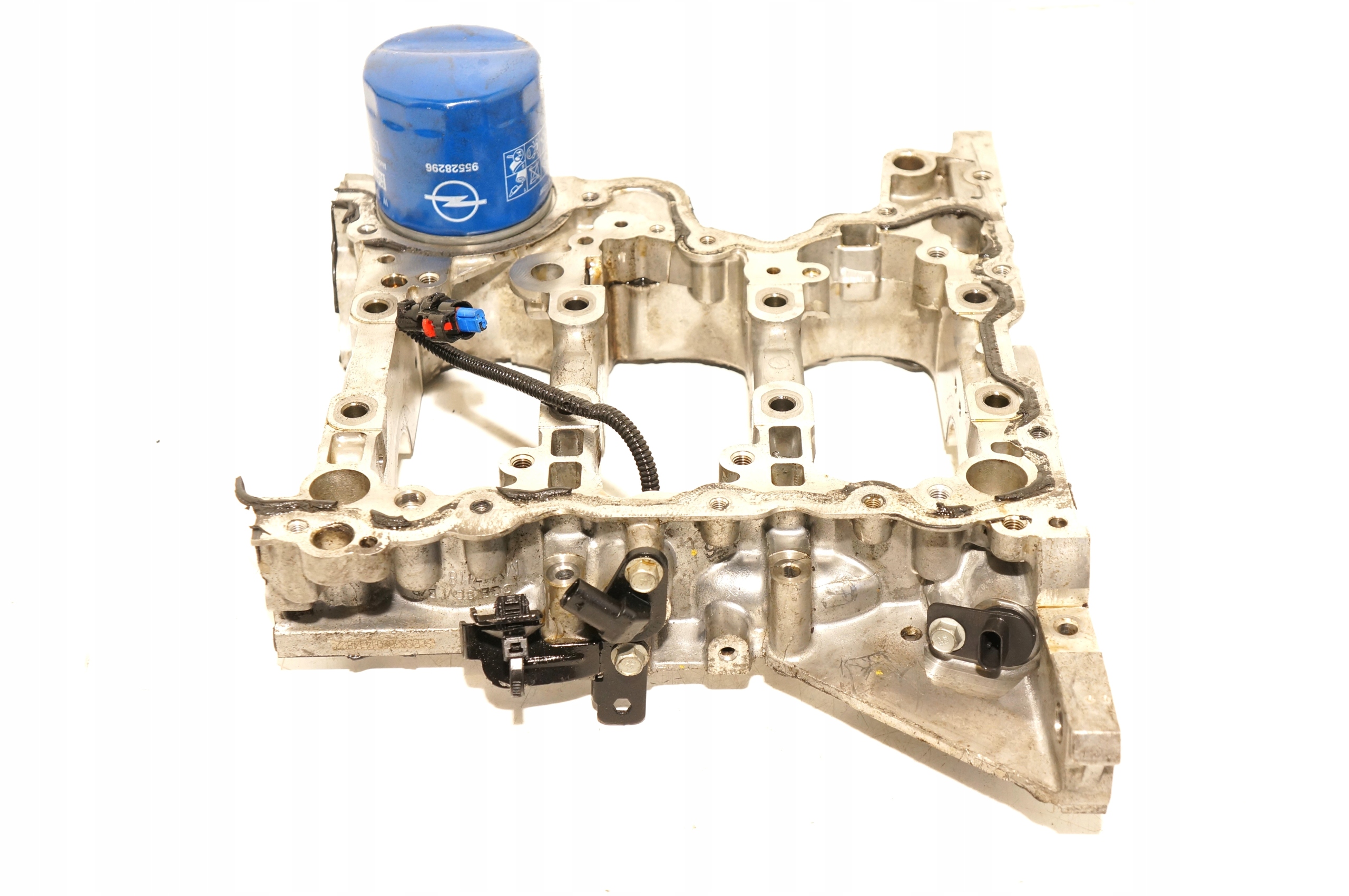 PÓŁMISKA PODSTAWA FILTRA OLEJU OPEL KARL CORSA E 1,0 12V B10XE L5Q 55492822