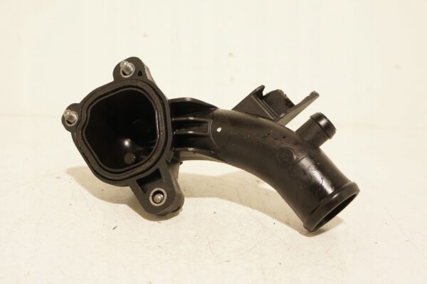 16771267661-69692e2487757 OBUDOWA TERMOSTSTU OPEL CORSA MERIVA 1.2 1.4 0112016A