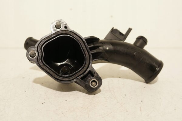 16771267661-69692e260e926 OBUDOWA TERMOSTSTU OPEL CORSA MERIVA 1.2 1.4 0112016A