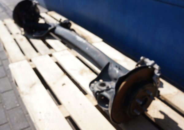 17533978476-696944ca04d48 BELKA TYLNA ZAWIESZENIA OŚ TYŁ TOYOTA YARIS IV