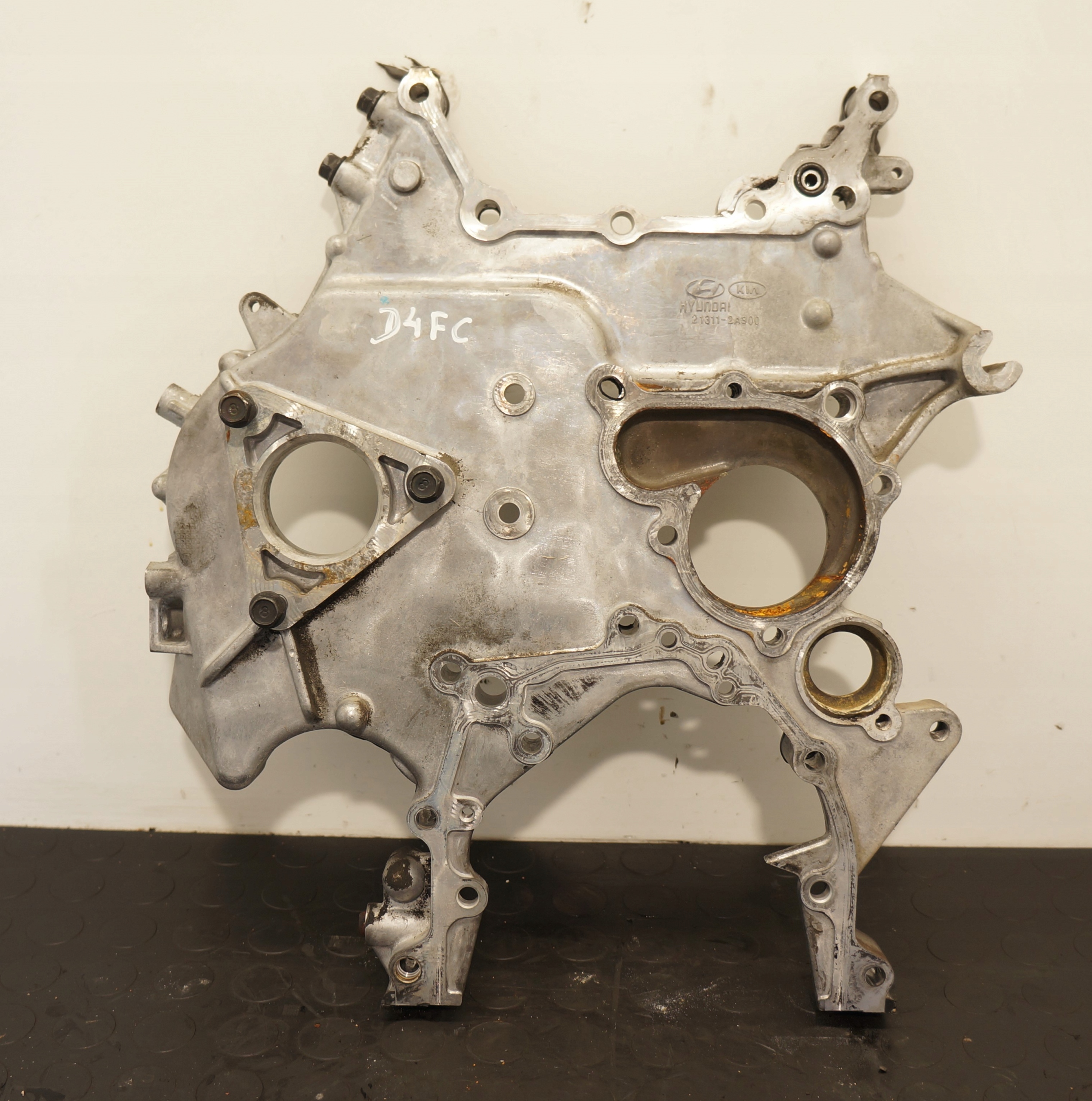 17703603803-696914f28d3f0 OBUDOWA ROZRZĄDU KIA RIO HYUNDAI I20 1.4 CRDI D4FC 21311-2A300