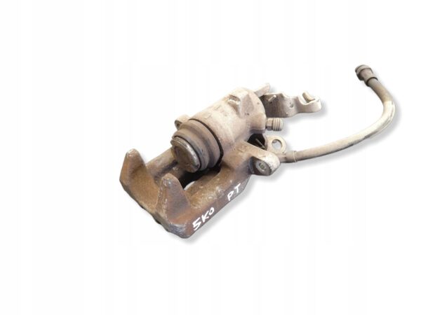 ZACISK HAMULCOWY TYŁ PRAWY VW GOLF OCTAVIA II AUDI A3 8P LEON 1K0615424J