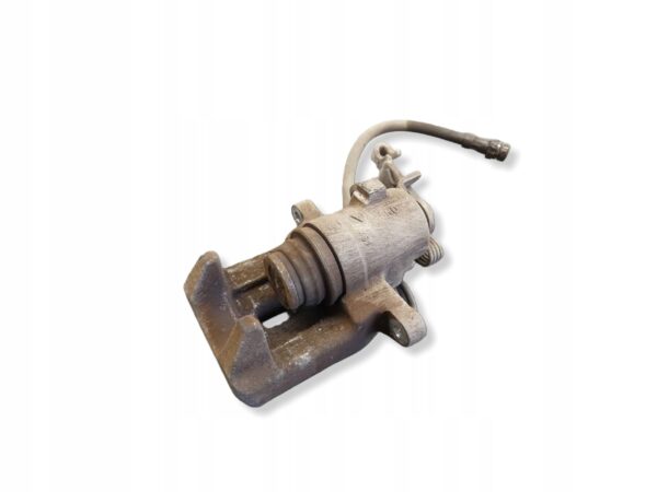 18441644406-69c3a665916f5 ZACISK HAMULCOWY TYŁ LEWY VW GOLF OCTAVIA II AUDI A3 8P LEON 1K0615423J